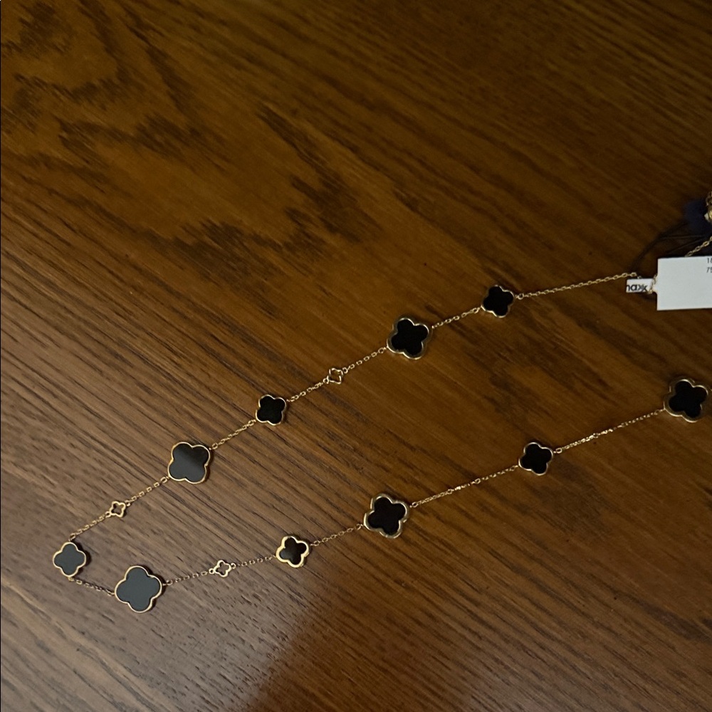 Elegant Black and Gold Clover Necklace